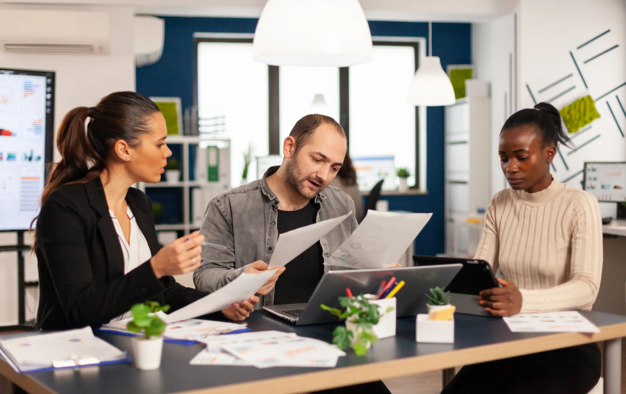Professionals reviewing documents together