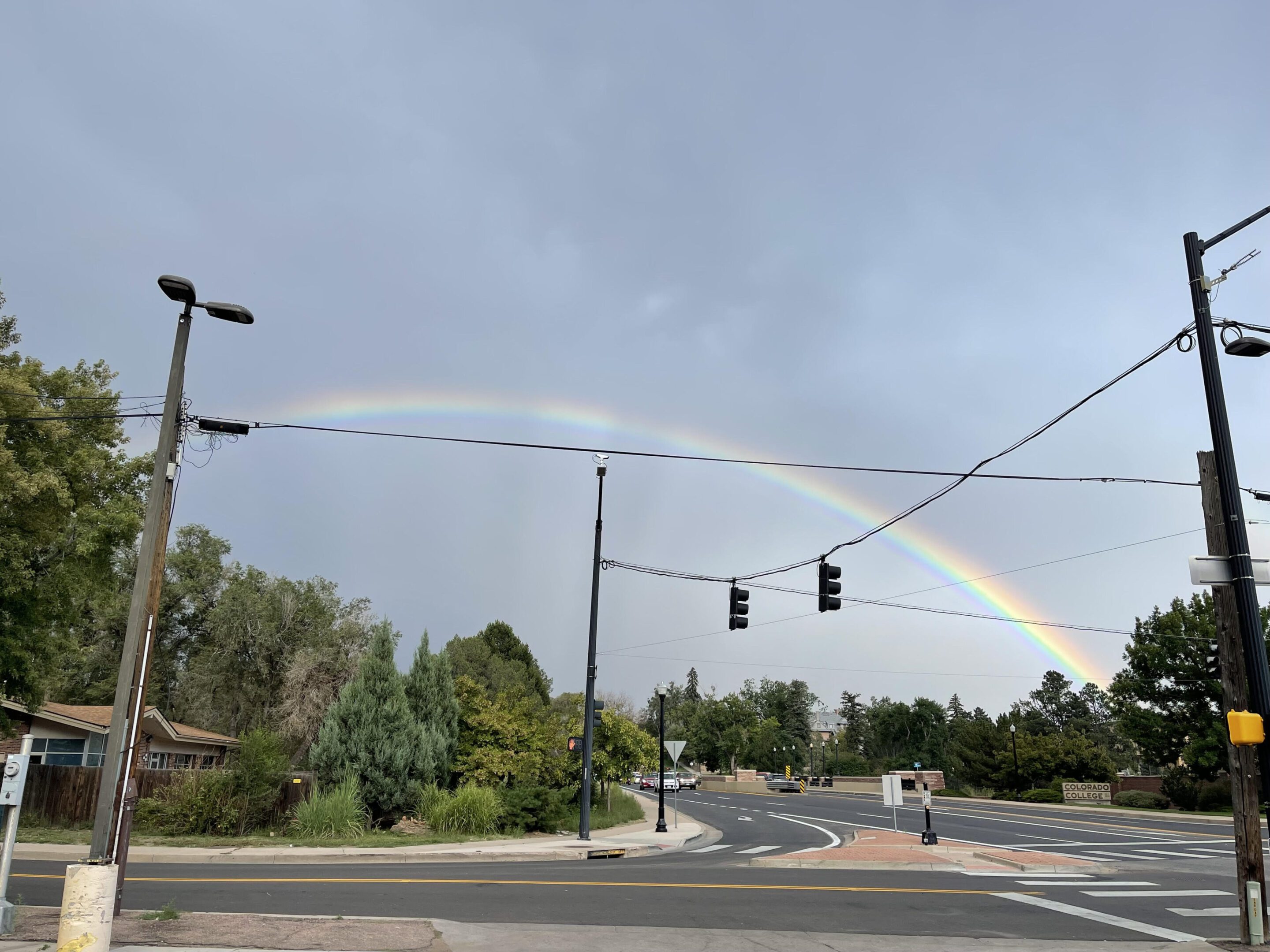 Rainbow over a Colorado Springs intersection near Colorado College — credit score article